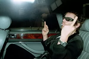 Cdburnt Collection: Michael Hutchence leaving Paula Yates flat giving the photographers the finger dbase msi
