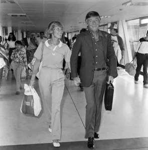 Michael Parkinson arrives at Heathrow with his wife Mary Michael Parkinson arrives at Heathrow with his wife Mary