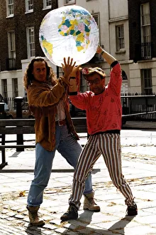 Michael Van Wijk Entertainer Holding model of world with Timmy Mallet on street Dbase Michael Van Wijk Entertainer Holding model of world with Timmy Mallet on street Dbase
