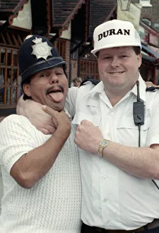 Middle Weight Boxer Roberto Duran seen here in the strong arm of the law as he hams it up Middle Weight Boxer Roberto Duran seen here in the strong arm of the law as he hams it up