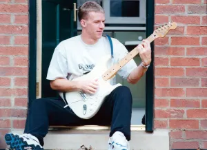Middlesbrough player Robbie Mustoe seen here playing his electric guitar Middlesbrough player Robbie Mustoe seen here playing his electric guitar