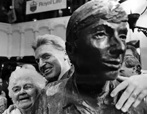 Images Dated 26th April 1984: Mike McCartney unveils a life size sculpture of The Beatles at the new Cavern Walks