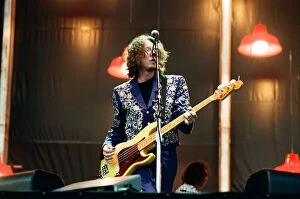 Bassist Gallery: Mike Mills. R.E.M. in concert at the Galpharm Stadium. 25th July 1995