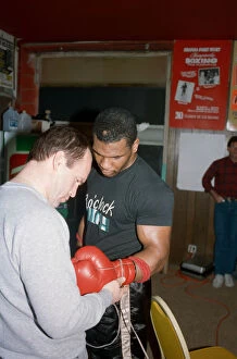 Images Dated 1st March 1987: Mike Tyson in his training camp with Kevin Rooney ahead of his bout with James