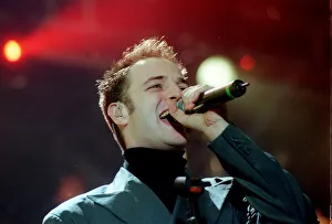 Mikey Graham of pop group Boyzone December 1999 singer singing performing at the SSEC in Mikey Graham of pop group Boyzone December 1999 singer singing performing at the SSEC in