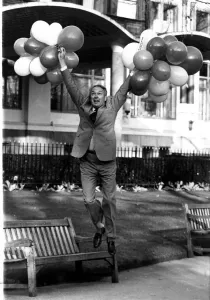Millionaire airline owner Freddie Laker holding a bunch of balloons after bouncing back Millionaire airline owner Freddie Laker holding a bunch of balloons after bouncing back