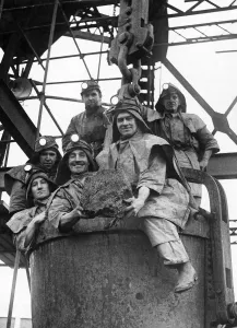 Miners cheer a lump of coal that took a year to dig out Miners cheer a lump of coal that took a year to dig out