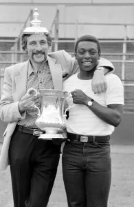 Mirror photographer Monte Fresco and Garth Crooks the day after winning the FA Cup Mirror photographer Monte Fresco and Garth Crooks the day after winning the FA Cup