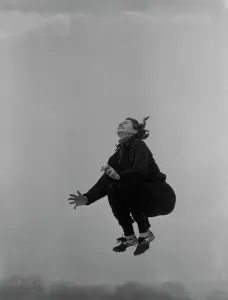 00002 Prints: Black and white print of a sprinter in mid-jump