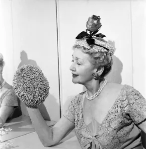 00010 Prints: Hedda Hopper Presents Two Hats to the Queen Print