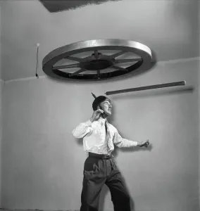 00017 Prints: Henri Vadden holds an 80lb cartwheel on a pole print
