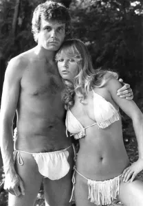 Fashion - Beachwear Print: A woman in a fringed bikini with cheeky side ties and gold-coloured bead trim