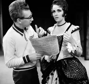 00032 Prints: Black and white print of a young woman in an opera rehearsal