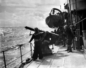 Print of a 2-pounder Pom-Pom firing at an unidentified aircraft, April 1940