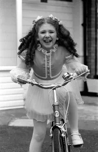 00038 Prints: Bonnie Langford Print 1975 Home on Bicycle