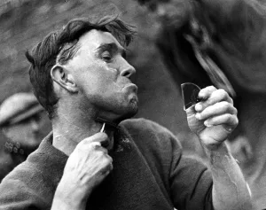00040 Prints: Print of a Man Shaving with Broken Mirror, Circa 1933