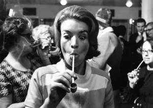 00042 Prints: 1969 Print: Young Woman with Unhappy Expression and Clay Pipe