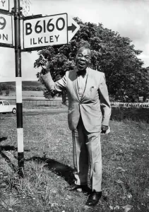 0000to0099 Prints: Louis Armstrong Print by a Yorkshire Signpost, 1968