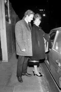 00045 Prints: Black and white print of a couple leaving hospital