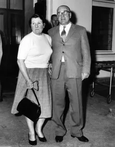 00048 Prints: Alfred Moss and wife leaving hospital with son