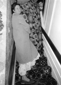 00051 Prints: October 1980 Print: Struggling Up the Stairs