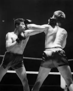00052 Prints: Sport Boxing Print: Willie Fisher lands left high on Alf Matthews' head