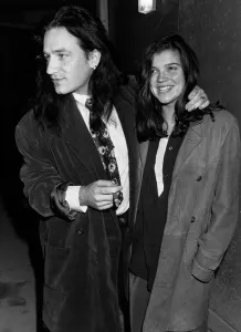 00054 Prints: Bono and Alison Hewson Leaving Langans Print 1989