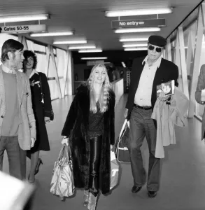 00055 Prints: Lynsey De Paul and Burt Lancaster at Heathrow Airport Print