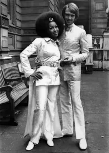 00056 Prints: Marsha Hunt in Silk Coat and Satin Trousers Print, March 1969