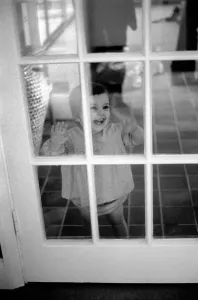 00057 Prints: Child of Peter Shelley with Dog, March 1975 Print