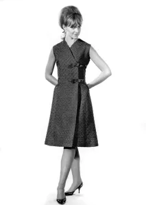 60s Fashion Trends Prints: Reveille Fashions: Ann Robert wearing a threee quarters length summer sleeveless dress