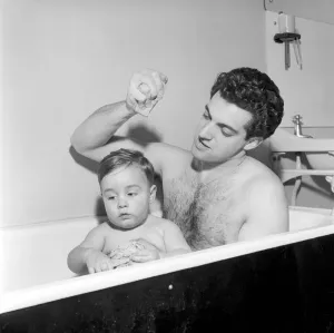 00062 Prints: Singer Frankie Vaughan Print - Bathing with Son. Circa 1957