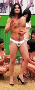 00065 Prints: Robbie Williams Print in White Briefs and Stilettoes