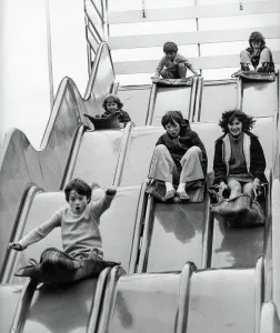 Prints of The Spanish City amusement park in Whitley Bay - youngsters enjoying the giant slide England Prints: Whitley Bay Spanish City Amusement Park Print
