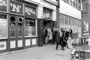 00069 Prints: Former Teddy Boys Outside Rock n Roll Cafe Print, May 1975
