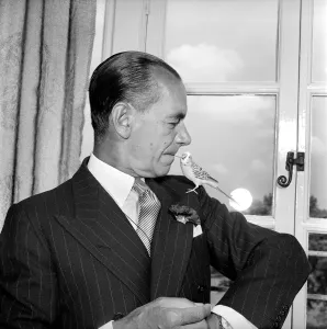 00070 Prints: Sir Malcolm Sargent with Pet Budgie Print, July 1957