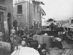 00073 Prints: Residents salvaging belongings from a damaged home in the Midlands, Print