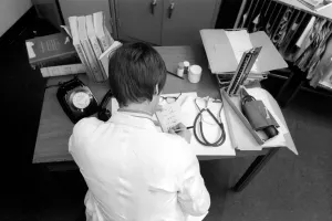00076 Prints: Busy Doctor's Desk Print, 1974