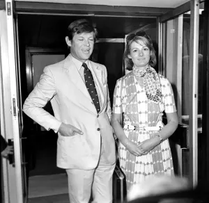 00076 Prints: Peter Jay with his wife at Heathrow Airport, Print