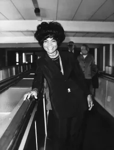 00097 Prints: Eartha Kitt at Heathrow Airport, London Print