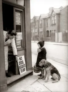 Mirror Prints: Little Girl and Dog Outside Corner Shop, March 1942 Print