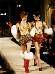 90s Fashion Model Prints: Model on the cat walk moddeling Vivienne Westwood designs at a fashion show waspies