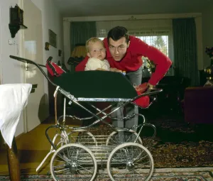 Print of Franz Beckenbauer with his son in a pram, June 1973