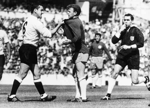 Dave Mackay grabs Billy Bremner's shirt in a Division One match