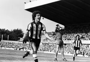 Prints of Newcastle Uniteds Kevin Keegan celebrates after scoring a goal on his debut at St James Park against Queens Park Rangers in the two teams league division one match. 28th August 1982 Northern Ireland Prints: Kevin Keegan's Debut Goal Print - St James Park 1982
