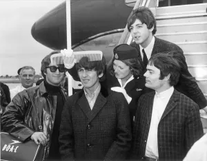 Prints of The Beatles - with stand in drummer Jimmie Nicol - return to London Heathrow Airport after 3 day tour of Denmark and Amsterdam Denmark Prints: The Beatles Return to London Heathrow Airport Print 7th June 1964