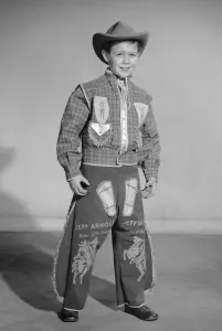 Vintage Fancy Dress Costumes Prints: Boy dressed as cowboy Jeff Arnold for a Reveille feature on dressing up 2nd December