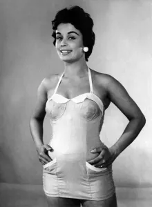 Retro Swimwear Designs Prints: Clothing Fashion 1955. Woman modelling swimming costumes. P015133