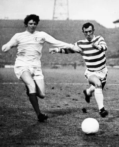 Prints of Eddie Gray of Leeds and Bobby Lennox of Celtic battle for possession. Celtic v Leeds European Cup Semi Final 2nd leg, 15th April 1970 0400to0499 Prints: Eddie Gray and Bobby Lennox Battle for Possession Print