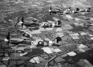 Prints of Four Supermarine Spitfire F Mark XIVs, of No. 610 Squadron on patrol over Southern England. September 1944 Aerial View Prints: Four Supermarine Spitfire F Mark XIVs, Southern England Print 1944
